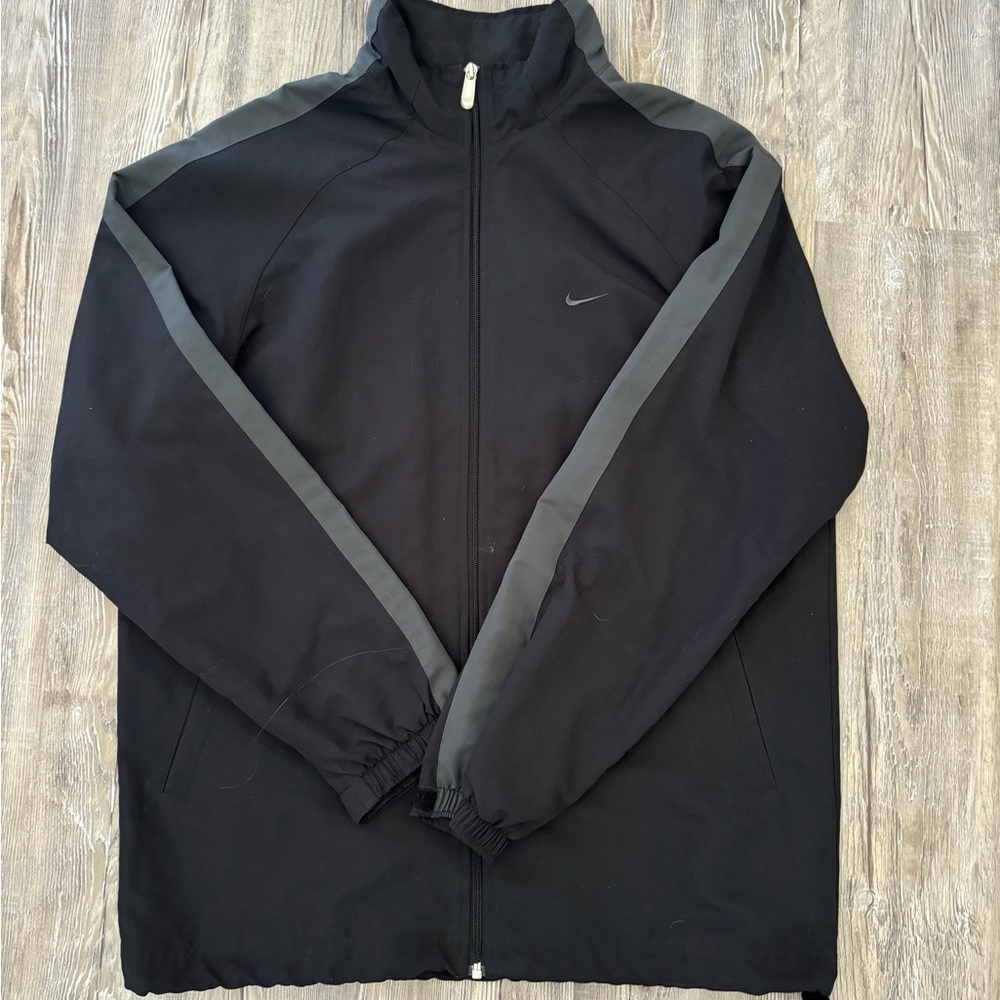 Vintage Nike black and grey track jacket. #vintage #1990